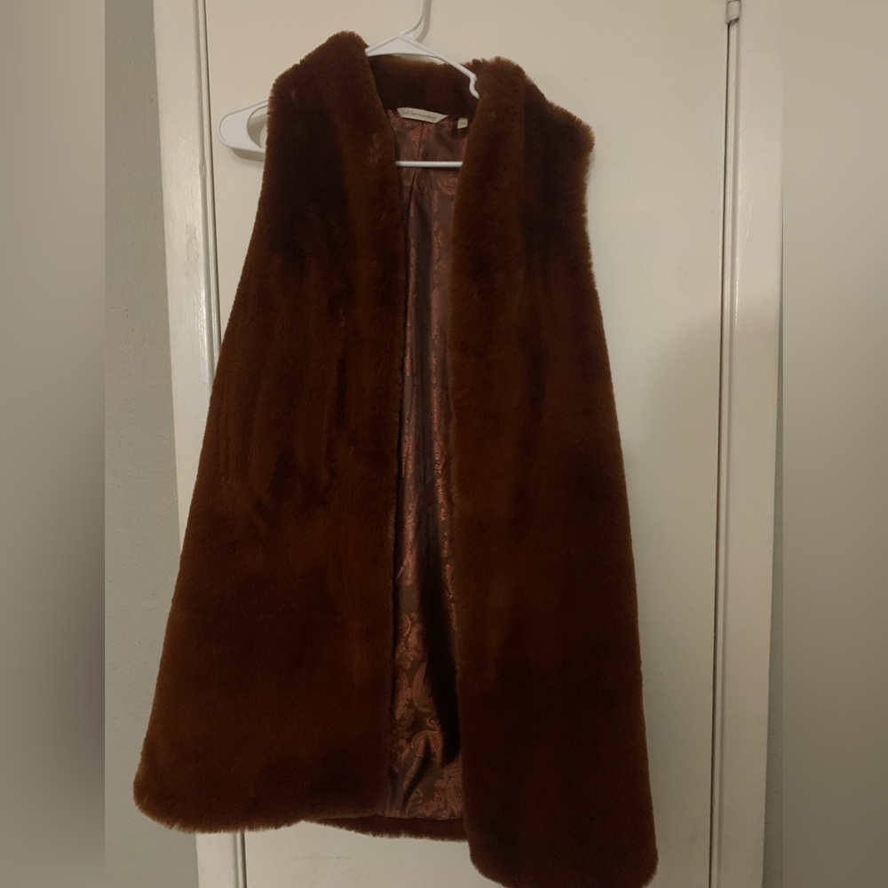 Gently worn once. Very soft. Nice silky inside.